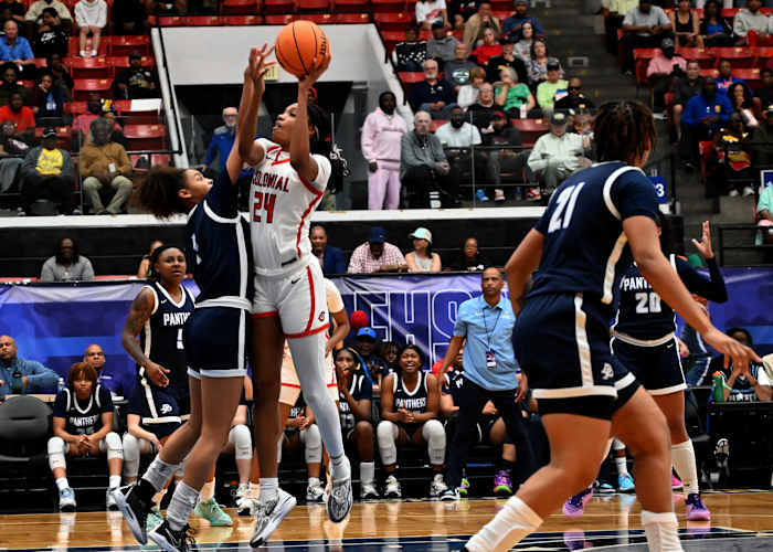 Colonial guard Jasmynne Gibson drives to the basket against Dr. Phillips during the FHSAA Class 7A girls basketball state championship game at The RP Funding Center Lakeland.